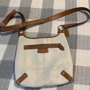 Cream Coach crossbody bag